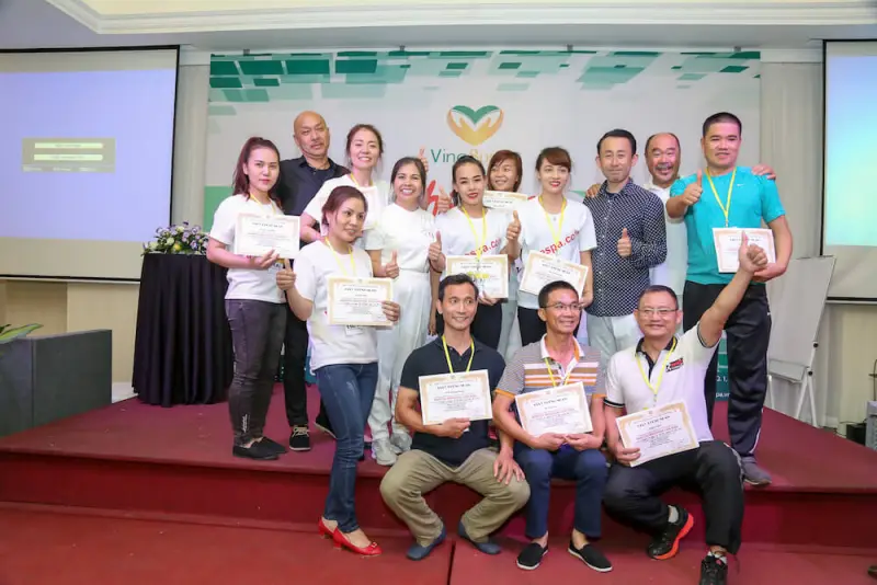 Khoẻ Spa therapists with their shiatsu course certificates